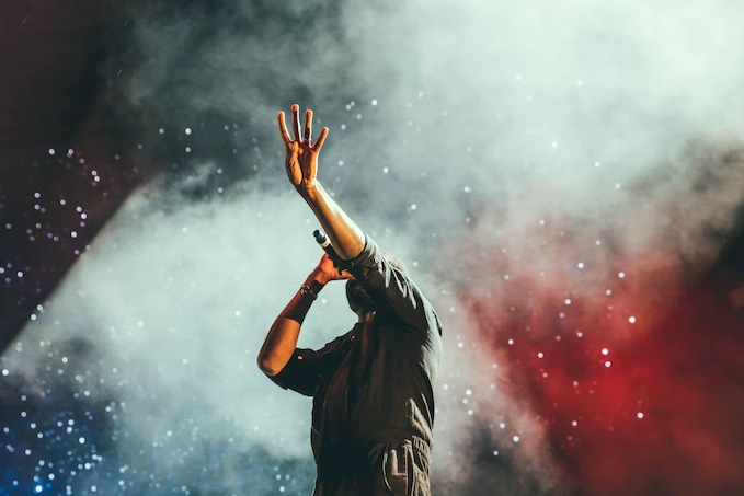 Artist singing to his fans