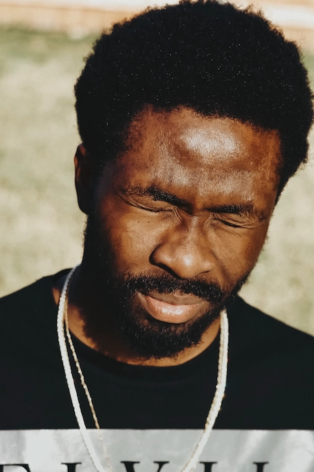 Portrait of a man with his eyes closed