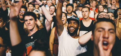 Two men enjoying a concert