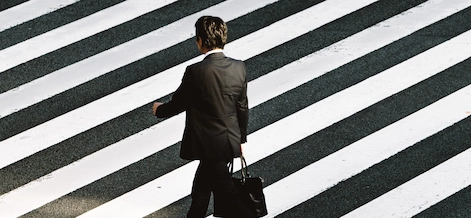 Employee crossing the sidewalk